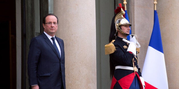 French president Francois Hollande stands after a meeting with Austrian republic president Heinz Fisher, at the Elysee Palace in Paris on November 5, 2013. AFP PHOTO/ ALAIN JOCARD (Photo credit should read ALAIN JOCARD/AFP/Getty Images)