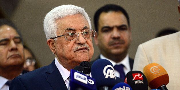 CAIRO, EGYPT - NOVEMBER 11 : Palestinian President Mahmoud Abbas talks to the media following a meeting with Al-Azhar Sheikh Ahmed El-Tayeb (not pictured) on November 11, 2013 in Cairo, Egypt. (Photo by Mustafa Ozturk/Anadolu Agency/Getty Images)