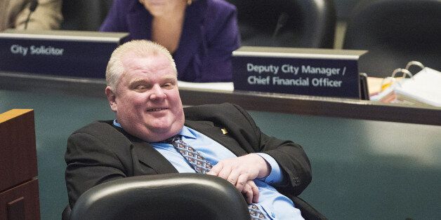 TORONTO, CANADA - NOVEMBER 15: Toronto Mayor Rob Ford sits during a Toronto City Council meeting at City Hall on November 15, 2013 in Toronto, Canada .The council voted to strip the embattled Ford striped him of striped him of authority during emergency situations and the ability to hire and fire the deputy mayor and appoint members of the executive committee. (Photo by Aaron Vincent Elkaim/Getty Images)