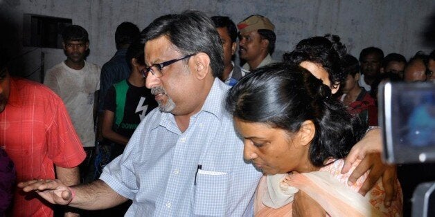 'GHAZIABAD, INDIA - SEPTEMBER 25: Dentist Nupur Talwar, facing trial in the twin murder case of her daughter Aarushi and domestic aide Hemraj, was today ordered by a CBI court to be released from prison on bail on September 25, 2012 in Ghaziabad, India. Her husband Rajesh Talwar also present there with her.( Photo by Sakib Ali/Hindustan Times via Getty Images)'