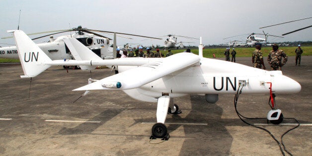 An Italian-made surveillance drone belonging to the UN's MONUSCO peacekeeping mission in the Democratic Republic of Congo waits to take off during its official launching ceremony at the airport in the northeastern city of Goma, capital of strife-torn North Kivu province, on December 3, 2013. The United Nations announced its peacekeeping troops will go after other armed groups in the Democratic Republic of Congo, after helping to defeat the M23 rebel force. The MONUSCO mission in the DR Congo currently has two such unarmed drones. Both are fitted exclusively for reconnaissance missions, to back up its ground forces. The mission is to be equipped with three more by March next year. AFP PHOTO/STRINGER (Photo credit should read STRINGER/AFP/Getty Images)