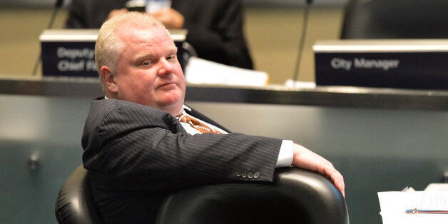 Toronto, ON - November 14 - Mayor Ford sits in Council.
Mayor Rob Ford attends a City Council meeting while sparks continu