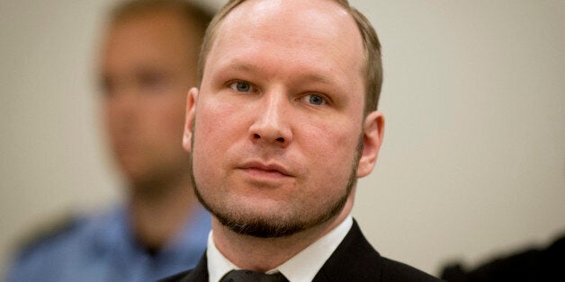 (FILES) A picture taken on August 24, 2012 shows self-confessed mass murderer Anders Behring Breivik arriving in court room 250 at the central court Oslo to be sentenced for his twin attacks last year that left 77 people dead, bringing to a close one of the most spectacular trials in Norway's history. Norwegian mass killer Anders Behring Breivik has said he wants to study political science at the University of Oslo, the institution said on July 30, 2013. AFP PHOTO / ODD ANDERSEN (Photo credit should read ODD ANDERSEN/AFP/Getty Images)