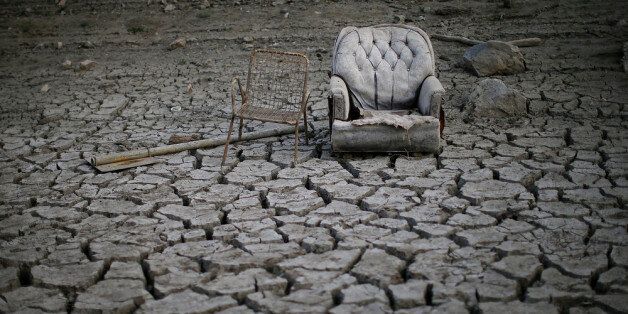 SAN JOSE, CA - JANUARY 28: Chairs sit in dried and cracked earth that used to be the bottom of the Almaden Reservoir on January 28, 2014 in San Jose, California. Now in its third straight year of drought conditions, California is experiencing its driest year on record, dating back 119 years, and reservoirs throughout the state have low water levels. Santa Clara County reservoirs are at 3 percent of capacity or lower. California Gov. Jerry Brown officially declared a drought emergency to speed up assistance to local governments, streamline water transfers and potentially ease environmental protection requirements for dam releases. (Photo by Justin Sullivan/Getty Images)