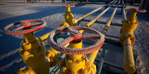 Ice covers valve control wheels connected to pipe work at OAO Gazprom's new Bovanenkovo deposit, a natural gas field near Bov