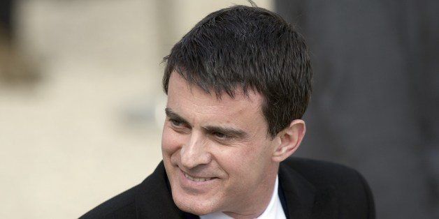 French Interior Minister Manuel Valls smiles as he leaves the Elysee Palace on March 26, 2014, in Paris, after the weekly cabinet meeting. AFP PHOTO / ALAIN JOCARD (Photo credit should read ALAIN JOCARD/AFP/Getty Images)