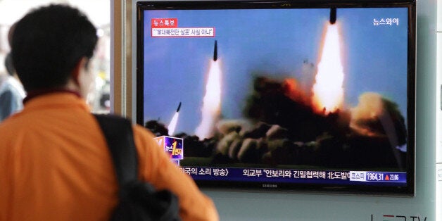 SEOUL, SOUTH KOREA - MARCH 26: A Man watchs a television broadcast reporting the North Korean missile launch at the Seoul Railway Station on March 26, 2014 in Seoul, South Korea. North Korea test-launched two Nodong medium-range ballistic missiles into the sea off Korean peninsula's east coast on Wednesday morning, according to South Korea's defence ministry. (Photo by Chung Sung-Jun/Getty Images)