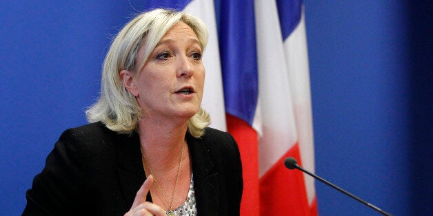 PARIS, FRANCE - MARCH 25: Marine Le Pen , President French far-right party National Front delivers a speech during a press conference following the first round of the mayoral elections at the party's headquarters on March 25, 2014 in Nanterre, France. The anti-immigration National Front made significant gains in the first round of the municipal elections. The second round of votes will take place on March 30, 2014. (Photo by Chesnot/Getty Images)