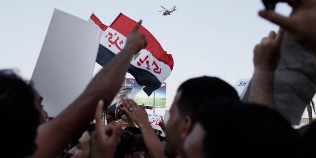 CAIRO, EGYPT - JULY 5: Supporters of former Egyptian President Mohammed Morsi demonstrate in front of the headquarters of th