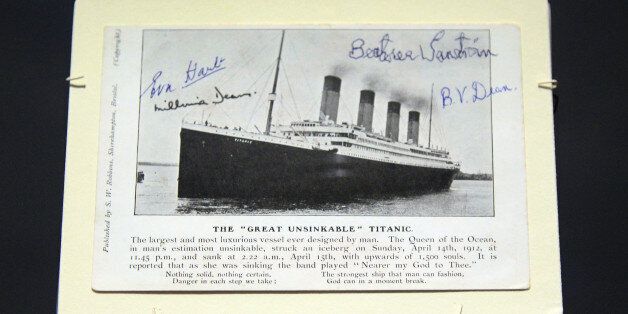 TO GO WITH AFP STORY BY ROBIN MILLARD 'TITANIC-HISTORY-100YEARS-DISASTER'A Titanic postcard signed by survivors Eva Hart, Bertam and Millvina Dean and Beatrice Sandstrom is shown on display at the Ulster Transport Musuem in Belfast, Northern Ireland on March 15, 2012. A century on since the grandest liner ever built sank to the bottom of the ocean on its maiden voyage, the legend of the Titanic still captivates the imagination the world over. AFP PHOTO / PETER MUHLY (Photo credit should read PETER MUHLY/AFP/Getty Images)