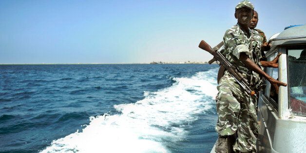 Somali coastguards patrol off the coast of Somalia's breakaway Republic of Somaliland on March 30, 2011. As piracy has flourished and turned increasingly violent, an unprecedented 17 countries are prosecuting pirates yet Somali jails have borne most of the burden. Officials in Somalia's semiautonomous region of Puntland have had to release low-level criminals to make room for pirates in overcrowded facilities as many countries, particularly along the East Africa coast turn-away arrested pirates for lack of resources and/or infrastructure to try and incarcerate them. Most suspected pirates captured by international warships are released because other nations don't want to jail them, a reason piracy continues to flourish at one of the world's busiest shipping lanes. AFP PHOTO/Tony KARUMBA (Photo credit should read TONY KARUMBA/AFP/Getty Images)