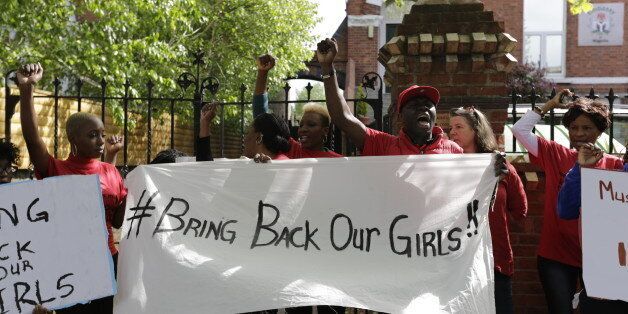 EMBASSY OF NIGERIA, DUBLIN, IRELAND - 2014/05/07: Nigerians and women's right campaigners protest outside the Nigerian Embassy in Dublin under the slogan 'Bring back out girls' against the alleged kidnapping of more than 250 girls from Chibok in Nigeria by Islamic jihadist and takfiri militant organisation Boko Haram on the night of 14 & 15 April 2014. They were calling the Nigerian government to do more to rescue the kidnapped girls. (Photo by Michael Debets/Pacific Press/LightRocket via Getty Images)