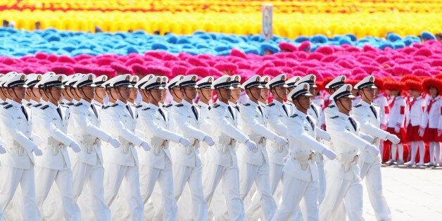 BEIJING - OCTOBER 01: Chinese People's Liberation Army (PLA) sailors march pass Tiananmen Square during the celebration of the 60th anniversary of the founding of the People's Republic of China on October 1, 2009 in Beijing, China. The grand celebrations to commemorate the 60th anniversary of the founding of the People's Republic of China included a military parade and mass pageant consisting of about 200,000 citizens in Tiananmen Square. (Photo by Feng Li/Getty Images)