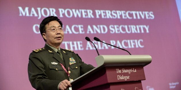 Deputy Chief of the General Staff of the People's Liberation Army (PLA) Wang Guanzhong speaks during the fourth plenary sessi