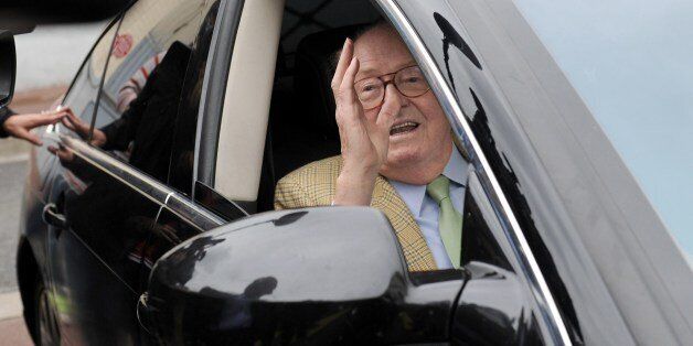 Founder and honorary president of the French far-right Front National (FN) party Jean-Marie Le Pen gestures as he arrives to attend a meeting gathering party leaders at the party's headquarters in Nanterre, outside Paris, on May 26, 2014. France suffered a political earthquake on May 25, 2014 as the far-right National Front topped the polls in European elections with an unprecedented haul of one in every four votes cast, exit polls indicated. AFP PHOTO / STEPHANE DE SAKUTIN (Photo credit should read STEPHANE DE SAKUTIN/AFP/Getty Images)