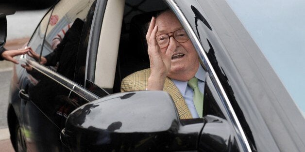 Founder and honorary president of the French far-right Front National (FN) party Jean-Marie Le Pen gestures as he arrives to
