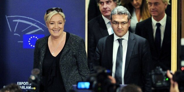 French far-right National Front (FN) party president Marine Le Pen (L), FN newly elected member of European parliament Aymeric Chauprade (2nd R), Dutch far-right 'Partij voor de Vrijheid' (PVV) party member of Senate Marcel De Graaf (2nd L) and PVV leader Geert Wilders (R), arrive to give a press conference gathering EU far right party leaders on May 28, 2014 at the EU Parliament in Brussels. Fresh from her shock victory in European elections on home turf, French far-right chief Marine Le Pen on May 28, 2014 launched a strong bid for leadership of the eurosceptic camp in Brussels. AFP PHOTO / GEORGES GOBET (Photo credit should read GEORGES GOBET/AFP/Getty Images)