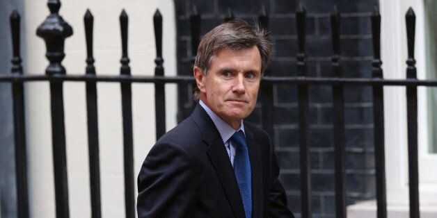 LONDON, ENGLAND - AUGUST 28: The head of MI6, Sir John Sawers arrives in Downing Street on August 28, 2013 in London, England. Prime Minister David Cameron is due to Chair a meeting of the National Security Council today before Parliament's recall tomorrow to debate the UK's response to a suspected chemical weapon attack in Syria. (Photo by Oli Scarff/Getty Images)