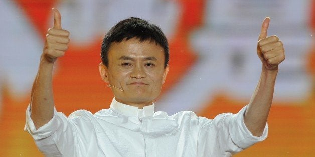 Alibaba founder Jack Ma gives a thumbs up after speaking at an event to mark the 10th anniversary of China's most popular onl