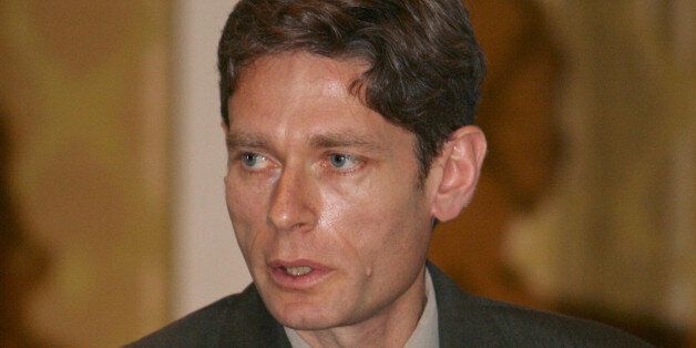 Tom Malinowski, the Washington advocacy director of Human Rights Watch (HRW), addresses a conference in Tripoli on December 12, 2009, attended by journalists, Western diplomats and families of the victims of a 1996 massacre by Libyan security forces of at least 1,200 prisoners. The New York-based HRW presented its report on Libya for the first time in the capital Tripoli, saying the north African country is making some progress on freedom of speech, eventhough a climate of repression remains. The report came two days after a foundation run by Libyan leader Moamer Kadhafi's son Seif al-Islam catalogued an array of cases of torture, wrongful imprisonment and other abuses in a report for 2009 and called for a 'transparent, just and fair' probe into the 1996 massacre at Abu Slim prison. AFP PHOTO/MAHMUD TURKIA (Photo credit should read MAHMUD TURKIA/AFP/Getty Images)