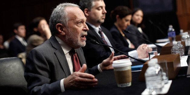 WASHINGTON, DC - JANUARY 16: Former U.S. Labor Secretary Robert Reich (L) testifies before the Joint Economic Committee January 16, 2014 in Washington, DC. Reich joined a panel testifying on the topic of 'Income Inequality in the United States.Ã (Photo by Win McNamee/Getty Images)