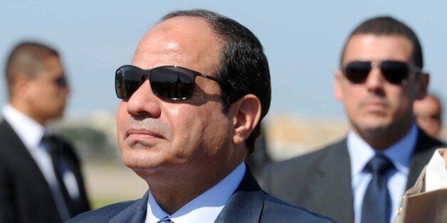 Egypt's president Abdel Fattah al-Sisi reviews troops upon his arrival at Houari-Boumediene International Airport on June 25, 2014 in Algiers. Sisi arrived in Algeria for his first trip abroad since being elected in May and he is expected to meet President Abdelaziz Bouteflika, notably to discuss ways of 'promoting the brotherly relations and cooperation that exist between the two countries and on issues linked to the situation in the Arab world and Africa'. AFP PHOTO/FAROUK BATICHE (Photo credit should read FAROUK BATICHE/AFP/Getty Images)