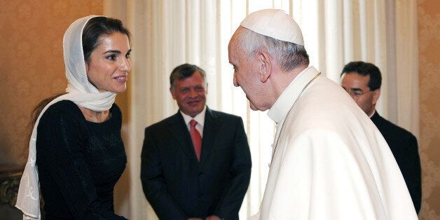 Pope Francis welcomes King of Jordan Abdullah II Ibn Hussein's wife Rania (L) during a private audience on August 29, 2013 at the Vatican. AFP PHOTO /POOL/ MAURIZIO BRAMBATTI (Photo credit should read MAURIZIO BRAMBATTI/AFP/Getty Images)