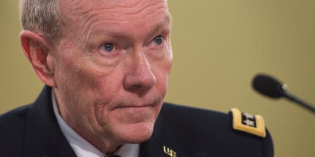 Chairman of the Joint Chiefs of Staff, General Martin Dempsey testifies before the House Appropriations Committee's Defense Subcommittee on the FY2015 Department of Defense budget at the US Capitol in Washington, DC, March 13, 2014. AFP PHOTO / Jim WATSON (Photo credit should read JIM WATSON/AFP/Getty Images)