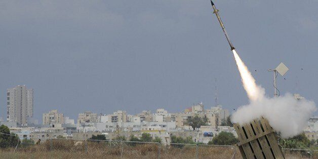 A missile is launched by an 'Iron Dome' battery, a short-range missile defence system designed to intercept and destroy incoming short-range rockets and artillery shells, on July 15, 2014 in the southern Israeli city of Ashdod. Israel will expand its week-long military campaign in the Gaza Strip if Hamas refuses to accept an Egyptian ceasefire plan, Prime Minister Benjamin Netanyahu warned. AFP PHOTO/DAVID BUIMOVITCH (Photo credit should read DAVID BUIMOVITCH/AFP/Getty Images)