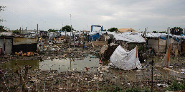 A photo taken on August 1, 2014 shows a view of the flooded UN Protection of Civilians (PoC) site in Upper Nile State capital Malakal, South Sudan. Some 11,600 internally displaced persons (IDP) have been relocated from the areas the worst affected by the heavy rains to a new UN Protection of Civilians (PoC) site built by UN Mission to South Sudan (UNMISS), according to the camp management team. South Sudan's warring leaders will resume peace talks next week, mediators said on August 1, amid warnings of famine within weeks if fighting continues. AFP PHOTO / CHARLES LOMODONG (Photo credit should read CHARLES LOMODONG/AFP/Getty Images)