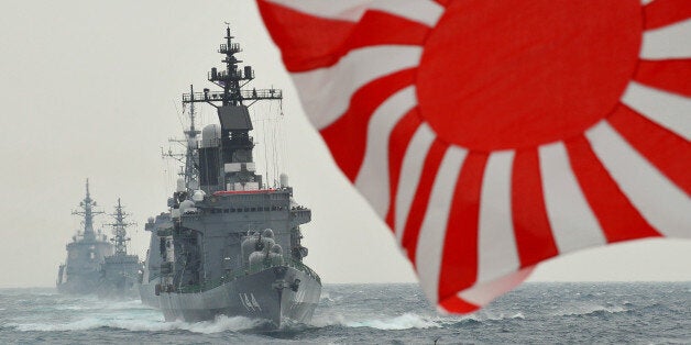 Japan Maritime Self-Defence Force escort ship Kurama sails during a 2009 fleet review in Sagami Bay, Japan's Kanagawa prefecture on October 25, 2009. AFP PHOTO/Katsumi Kasahara (Photo credit should read KATSUMI KASAHARA/AFP/Getty Images)