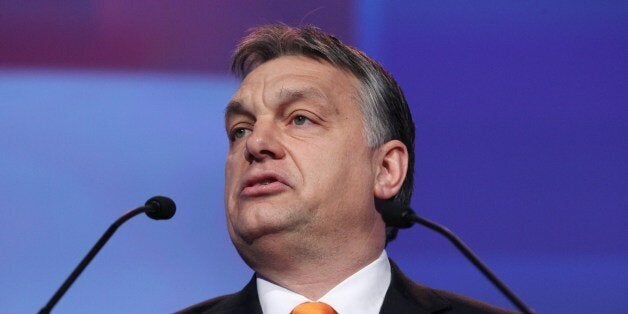 Viktor OrbÃ¡n, Prime Minister of Hungary, addresses delegates at the Dublin Convention Centre in Dublin, Ireland, on March 7, 2014 during The European Peoples Party (EPP) conference. European conservatives picked former Luxembourg prime minister Jean-Claude Juncker as their candidate to be the next European Commission president -- igniting the centre right grouping's campaign for European elections in May. Juncker comfortably defeated Michel Barnier, a French EU commissioner, at a congress of the European People's Party (EPP) in Dublin by 382 votes to 245. AFP PHOTO / PETER MUHLY (Photo credit should read PETER MUHLY/AFP/Getty Images)