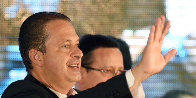 Brazilian presidential candidate for the Socialist Party (PSB) Eduardo Campos waves during the candidacy pre-launch ceremony in Brasilia on April 14, 2014. AFP PHOTO/Evaristo SA (Photo credit should read EVARISTO SA/AFP/Getty Images)