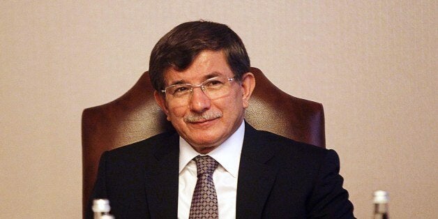 Turkey's Foreign Minister Ahmet Davutoglu attends a meeting in Ankara on August 20, 2014. Turkish President Abdullah Gul said