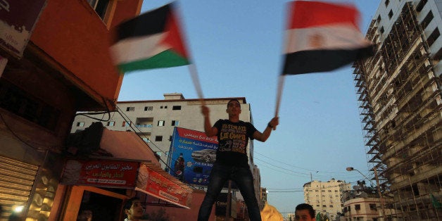 GAZA CITY, GAZA - AUGUST 26 : Palestinians celebrate the ceasefire between Palestinian resistance factions and Israel in Gaz