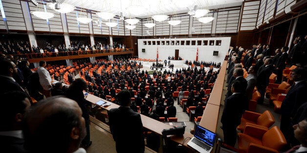 ANKARA, TURKEY - AUGUST 28: Turkish President-elect Recep Tayyip Erdogan swears in as the Republic of Turkey's 12th president at the Turkish Grand National Assembly on August 28, 2014 in Ankara, Turkey. (Photo by Volkan Furuncu/Anadolu Agency/Getty Images)