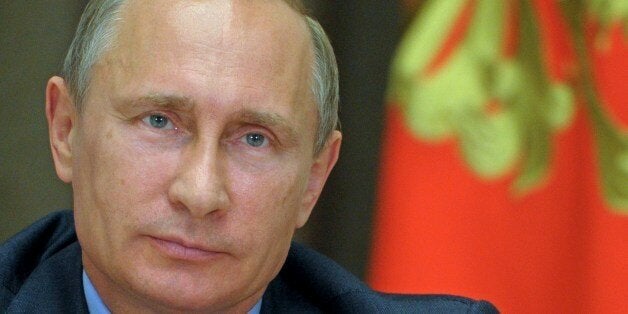 Russia's President Vladimir Putin takes part a video conference with Arctic oil drilling platform West Alpha in the Bocharov