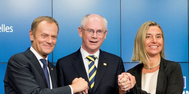 BRUSSELS, BELGIUM - AUGUST 30: Polish Prime Minister and EU Council president-elect Donald Tusk (L), outgoing European Council President Herman Van Rompuy (C) and New High Representative for Foreign Affairs and Security Policy and Italian Foreign Affairs minister, Federica Mogherini (R) pose after European Union leaders are set to meet in a summit Saturday to discuss internal and international affairs at the European Union summit at the EU Headquarters in Brussels, Belgium on August 30, 2014. European Union leaders have nominated Italy's Mogherini to become the 28-nation bloc's new foreign policy chief for the next five years and Polish Prime Minister Donald Tusk to succeed European Council President Herman Van Rompuy in December. (Photo by Dursun Aydemir/Anadolu Agency/Getty Images)