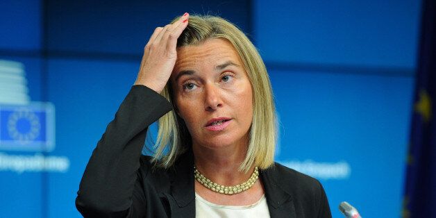 BRUSSELS, BELGIUM - AUGUST 30: New High Representative for Foreign Affairs and Security Policy and Italian Foreign Affairs minister, Federica Mogherini holds a press conference at the European Union summit at the EU Headquarters in Brussels, Belgium on August 30, 2014. The blocs outgoing foreign policy chief Catherine Ashton is to be replaced by Italy's Mogherini to become the 28-nation bloc's new foreign policy chief for the next five years. (Photo by Dursun Aydemir/Anadolu Agency/Getty Images)
