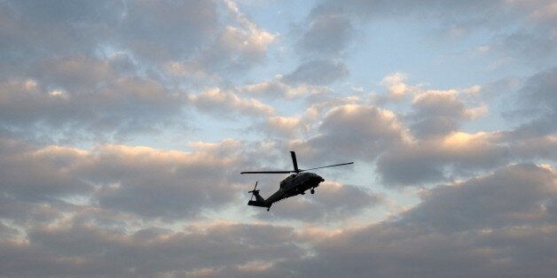 A US Marine helicopter with staff accompannying US President Barack Obama prepares to land in Newport, Wales on September 3,