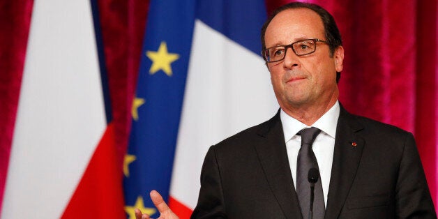 France's president Francois Hollande delivers his speech during a press conference with Czech Republic president Milos Zeman after their meeting at the Elysee Palace in Paris, Tuesday, Sept. 9, 2014. (AP Photo/Francois Mori)