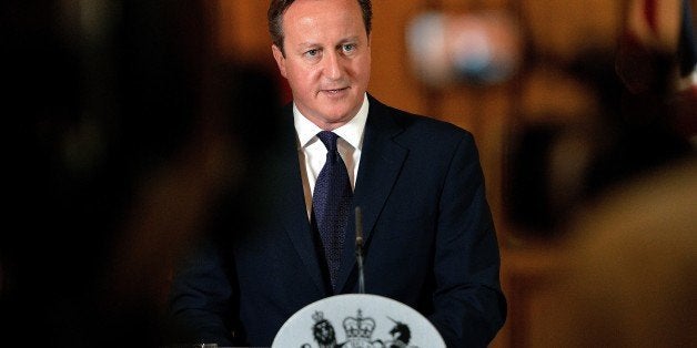 Prime Minister David Cameron makes a statement to the media at Number 10 Downing street in London on September 14, 2014 on th