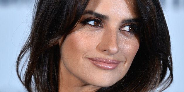 Spanish actress Penelope Cruz poses for pictures as she arrives for a special screening for her latest film 'The Counsilor', directed by Ridley Scott, in London on October 3, 2013. AFP PHOTO/BEN STANSALL (Photo credit should read BEN STANSALL/AFP/Getty Images)