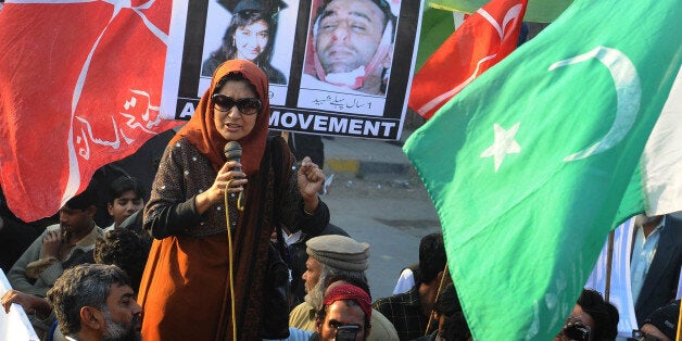 Fauzia Siddiqui, sister of Aafia Siddiqui who is being sentenced to 86 years in prison for trying to shoot US military officers, leads a protest in front of the US Consulate in Lahore on January 29, 2012. Siddiqui was sentenced to 86 years in jail by a US court who found her guilty of the attempted murder of US military officers in Afghanistan in 2008. AFP PHOTO/Arif ALI (Photo credit should read Arif Ali/AFP/Getty Images)