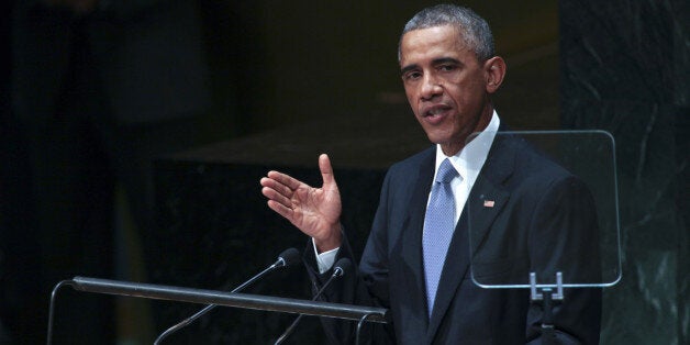 NEW YORK, NY - SEPTEMBER 24: (AFP OUT) U.S. President Barack Obama speaks at the 69th United Nations General Assembly at United Nations Headquarters on September 24, 2014 in New York City. The annual event brings political leaders from around the globe together to report on issues meet and look for solutions. This year's General Assembly has highlighted the problem of global warming and how countries need to strive to reduce greenhouse gas emissions. (Photo by Allan Tannenbaum-Pool/Getty Images)