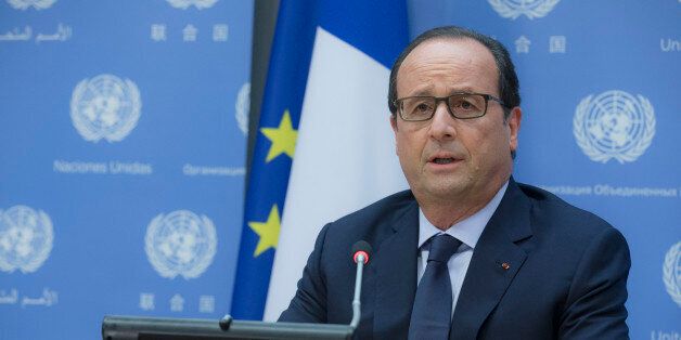 French President Francois Hollande speaks during a news conference, Wednesday, Sept. 24, 2014, at United Nations headquarters. Hollande responded to the beheading of French mountaineer Herve Gourdel by an Algerian splinter group from al-Qaida over France's airstrikes on the Islamic State group. (AP Photo/John Minchillo)
