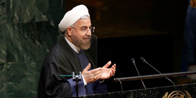 President Hassan Rouhani of Iran addresses the 69th session of the United Nations General Assembly at U.N. headquarters, Thursday, Sept. 25, 2014. (AP Photo/Jason DeCrow)