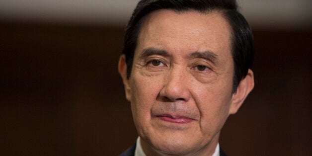 Ma Ying-jeou, Taiwan's president, pauses during an interview in the presidential palace in Taipei, Taiwan, on Thursday, July 25, 2013. Ma ruled out driving down the Taiwan dollar to boost exports following the currencys rally against the yen and said the government still aims for growth of at least 2 percent this year. Photographer: Jerome Favre/Bloomberg via Getty Images 