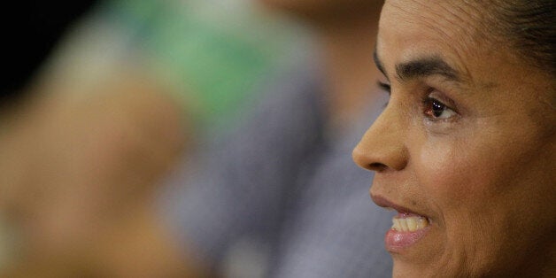 Former Senator and Environment Minister Marina Silva gives a news conference regarding her possible candidature for presidential elections in Brasilia, Brazil, Friday, Oct. 4, 2013. Silva, the top-polling opposition candidate for next year's presidential election, has failed to obtain enough signatures to register her new party, Brazil's top electoral court has ruled. She has until Saturday to decide whether to join an existing party's ticket. (AP Photo/Eraldo Peres)