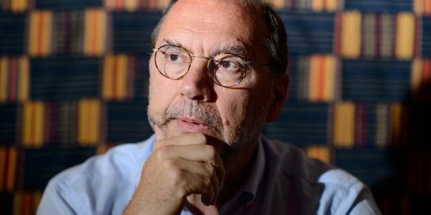 Professor Peter Piot, the Director of the London School of Hygiene and Tropical Medicine, speaks during an interview at his office in central London, England, on July 30, 2014. Professor Piot was one of the co-discoverers of the Ebola virus during its first outbreak in Zaire, in 1976. AFP PHOTO/Leon NEAL (Photo credit should read LEON NEAL/AFP/Getty Images)